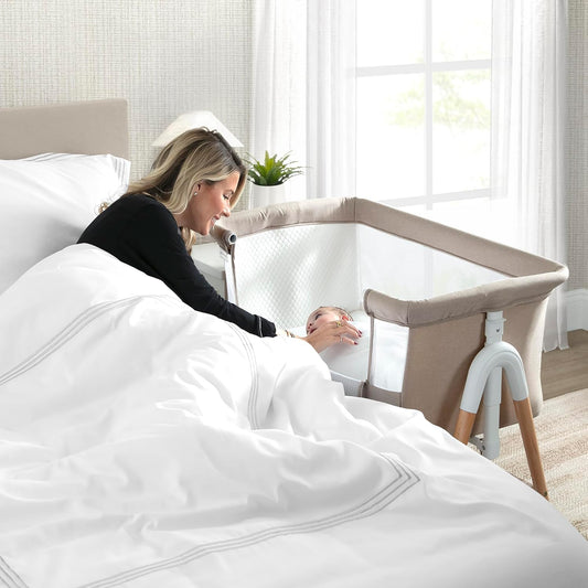 Delta Children Bondi Adjustable Height Bedside Beechwood Bassinet (Tan) - Kidsy