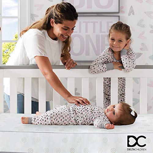 New Delta Children Twinkle Galaxy Dual Sided Crib and Toddler Mattress (White) - Kidsy