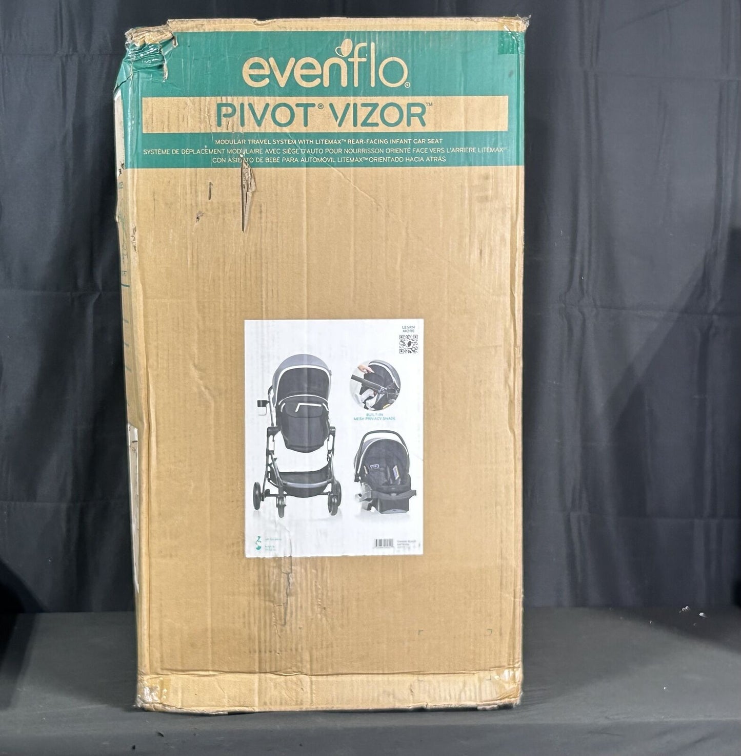 New Evenflo Pivot Vizor Travel System with Car Seat (Black Chasse)